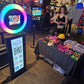 Guests posing with props at the LCD Photo Booth