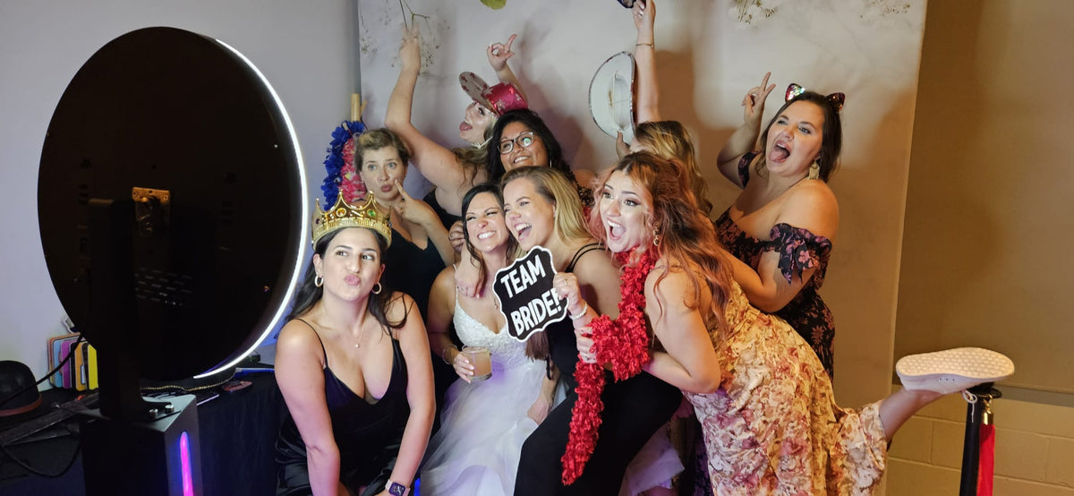 Guests using the Selfie Station photo booth
